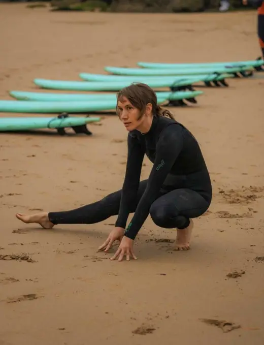 Stretching before surfing the bay