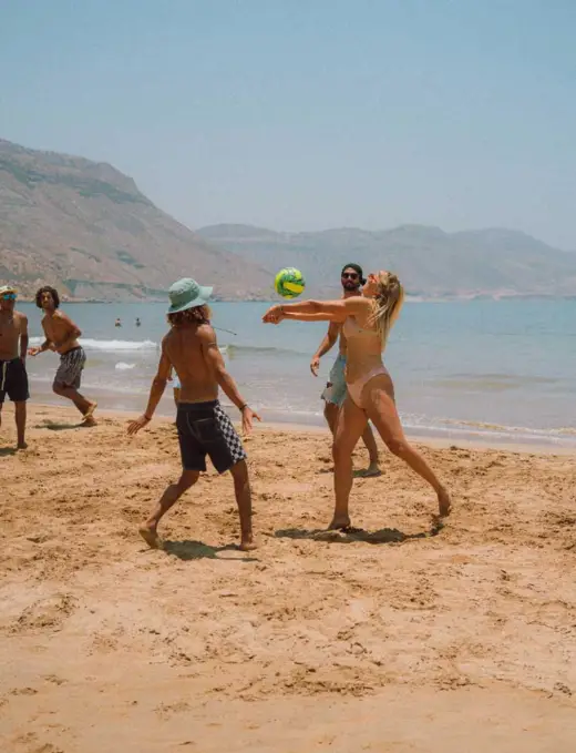 playing voleyball in the imsouane bay